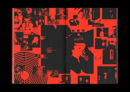 黒と赤を基調としたアートワークによる本の見開きページ