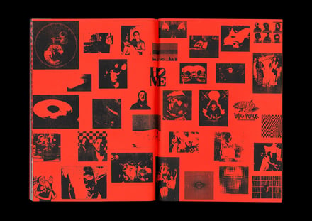 黒と赤を基調としたアートワークによる本の見開きページ