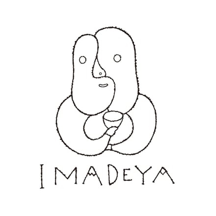 酒店「IMADEYA SUMIDA」の英字ロゴと人の顔を模したキャラクターの絵