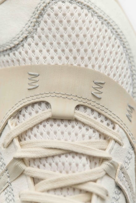 District Vision and New Balance MT10O