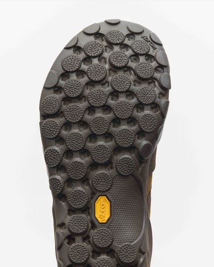 District Vision and New Balance MT10O
