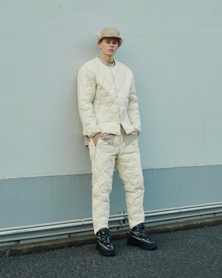 タイオンとホワイトマウンテニアリングがコラボレーションで発売するダウンジャケットとダウンパンツのルック画像