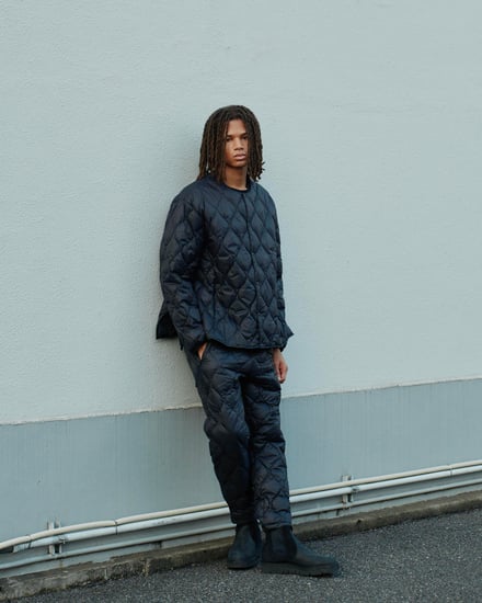 タイオンとホワイトマウンテニアリングがコラボレーションで発売するダウンジャケットとダウンパンツのルック画像