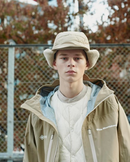 タイオンとホワイトマウンテニアリングがコラボレーションで発売するダウンジャケットとダウンパンツのルック画像