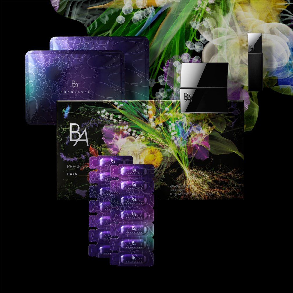 白や黄色、紫の花が描かれたボックスと黒い容器に入ったクリーム、紫のパッケージに入った美容液
