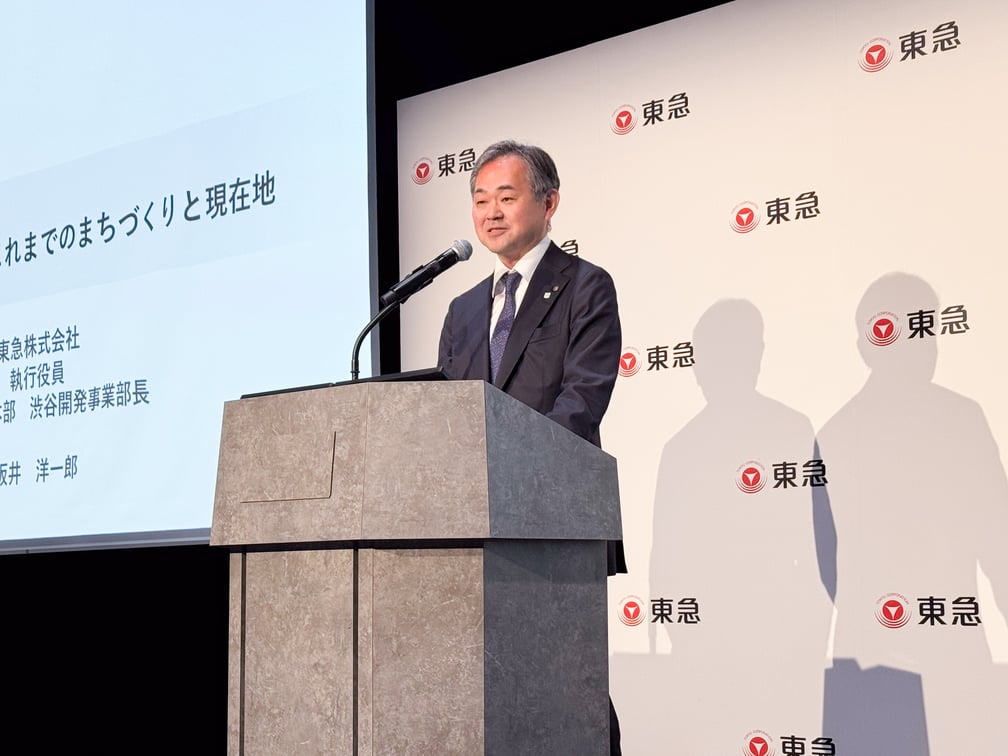 登壇する坂井氏
