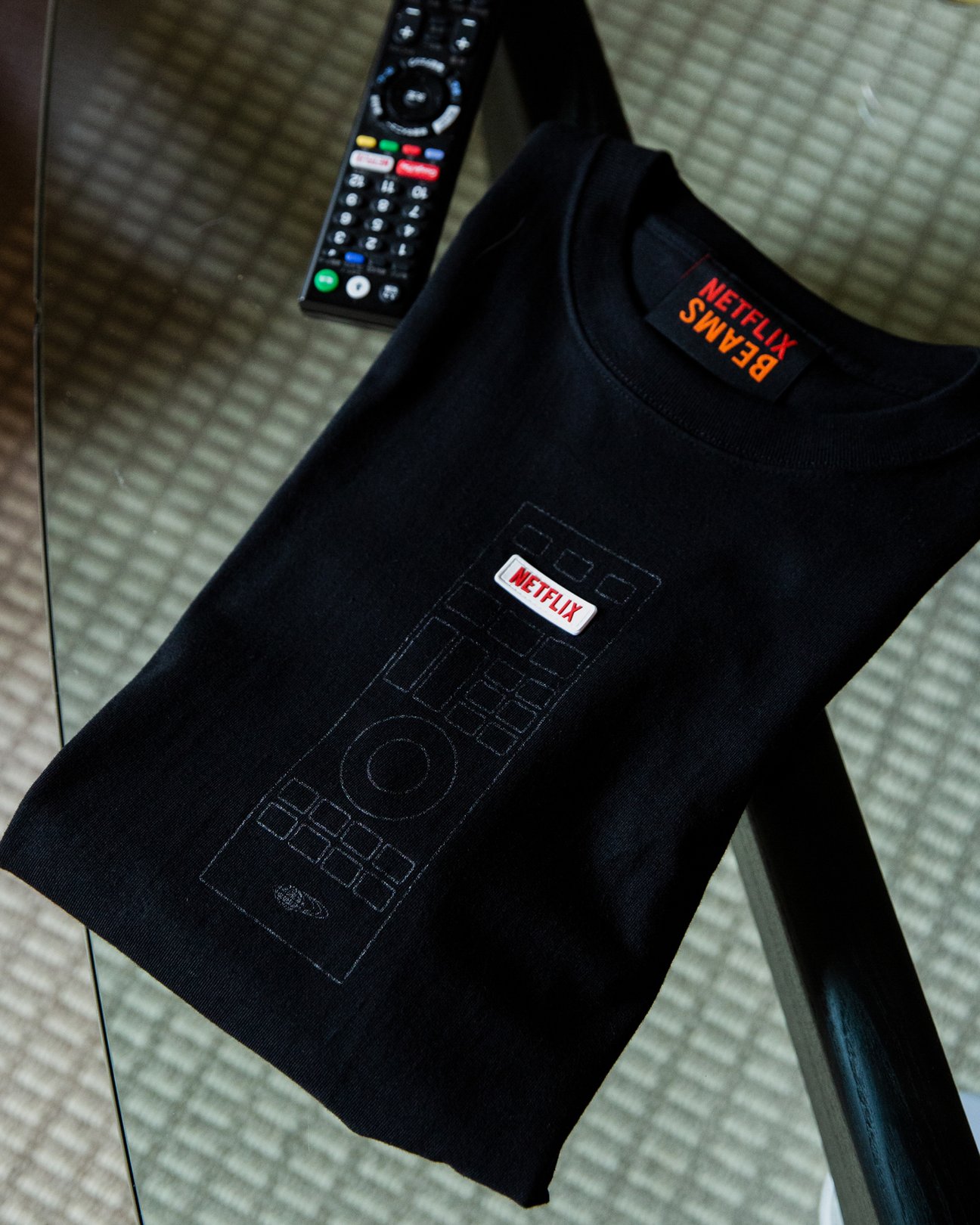 Netflix初の公式アイテム、ビームスとのコラボでTシャツや
