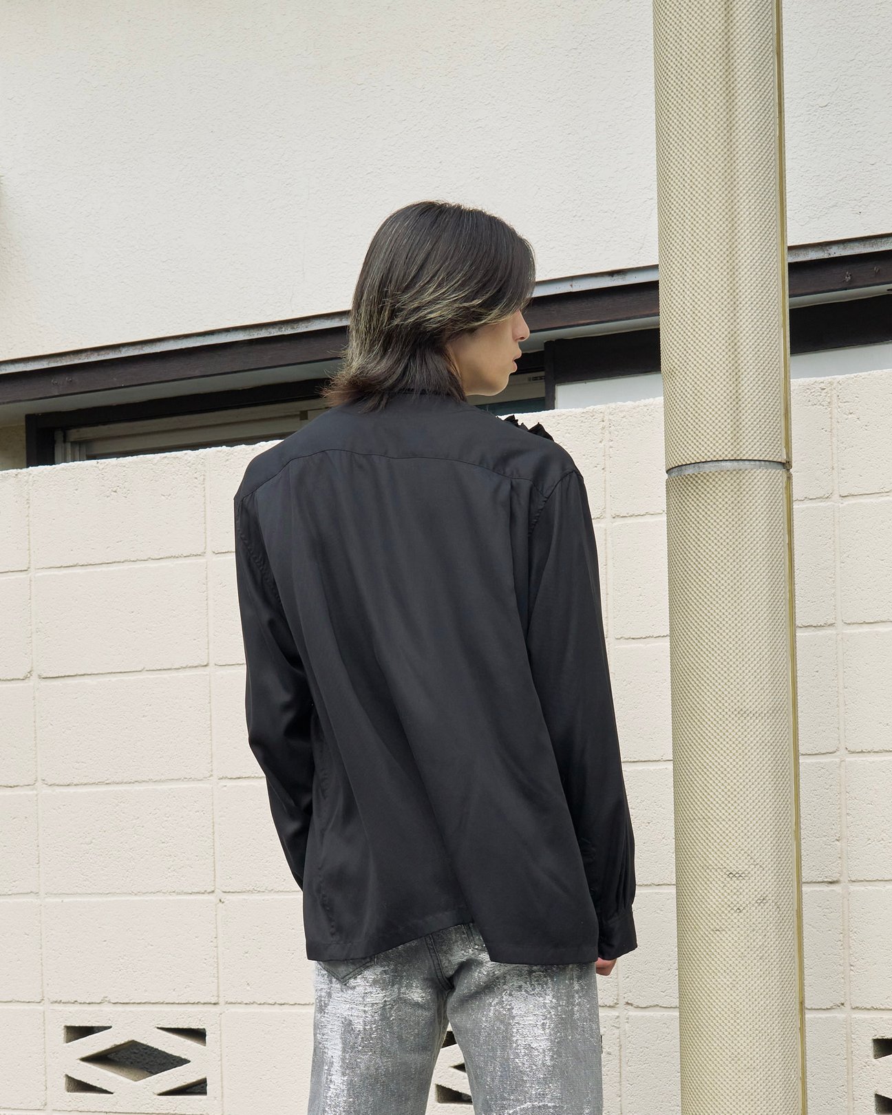 タークの洋服を着たモデル