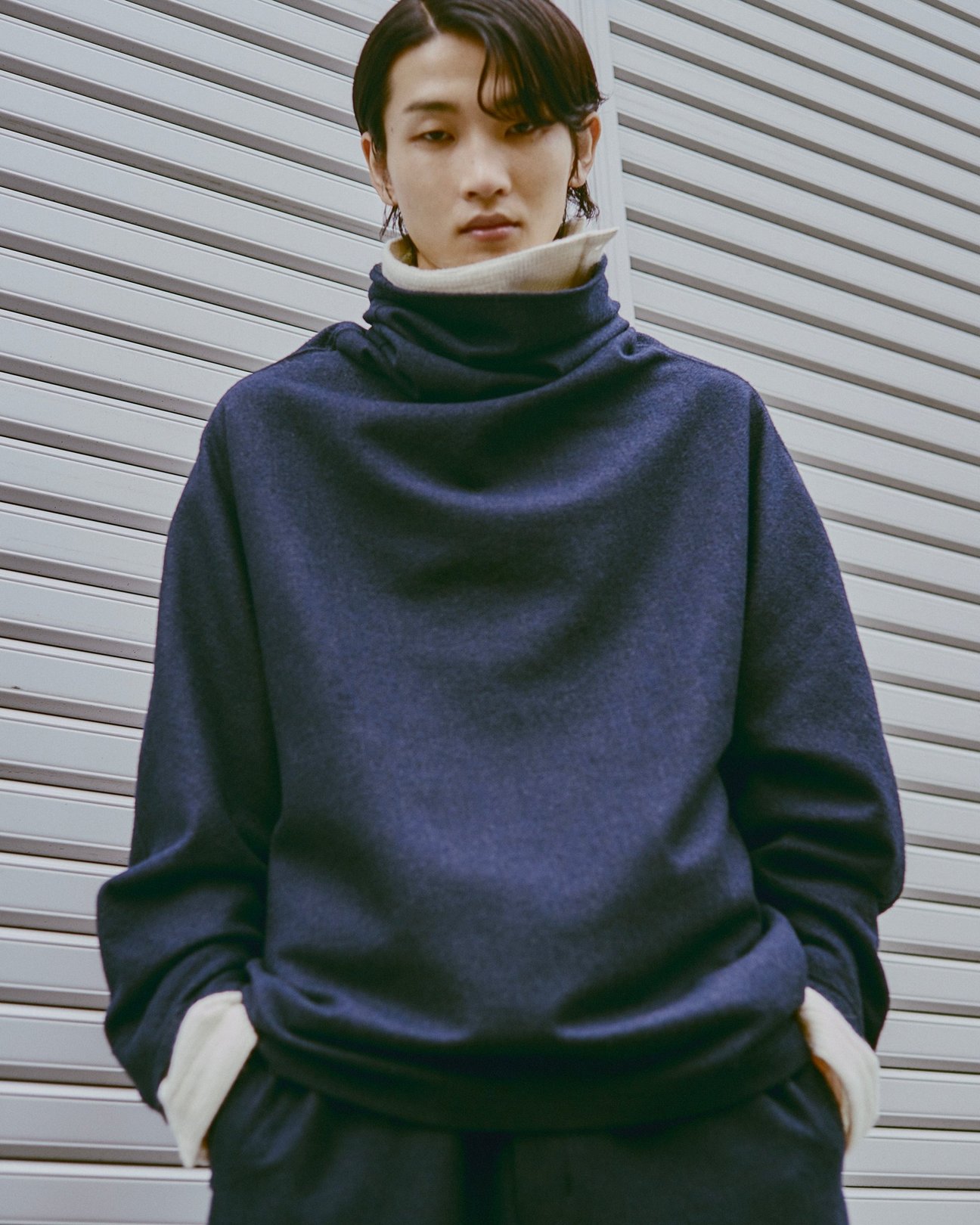 ノノットの洋服を着た男性モデル