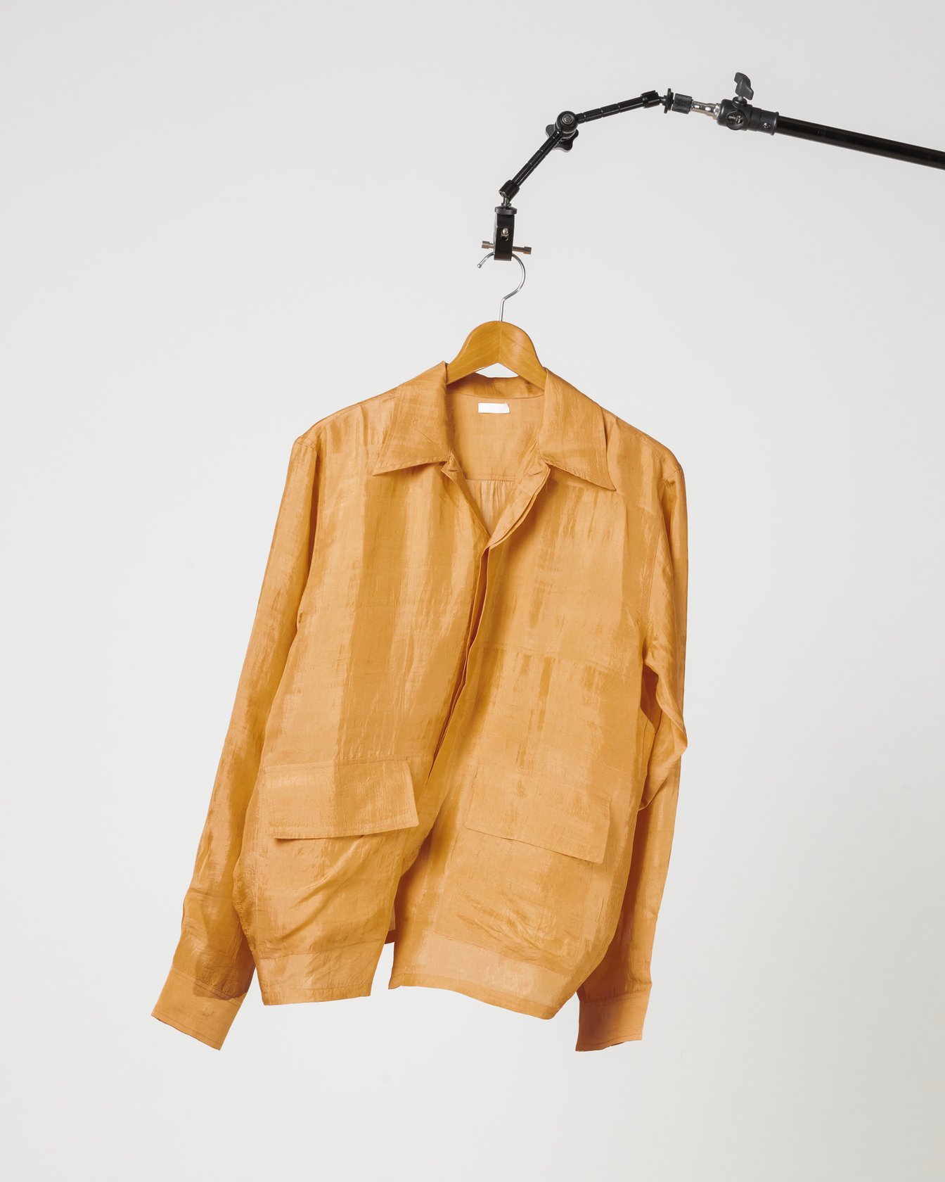 シーオールのオレンジカラーのシャツジャケット