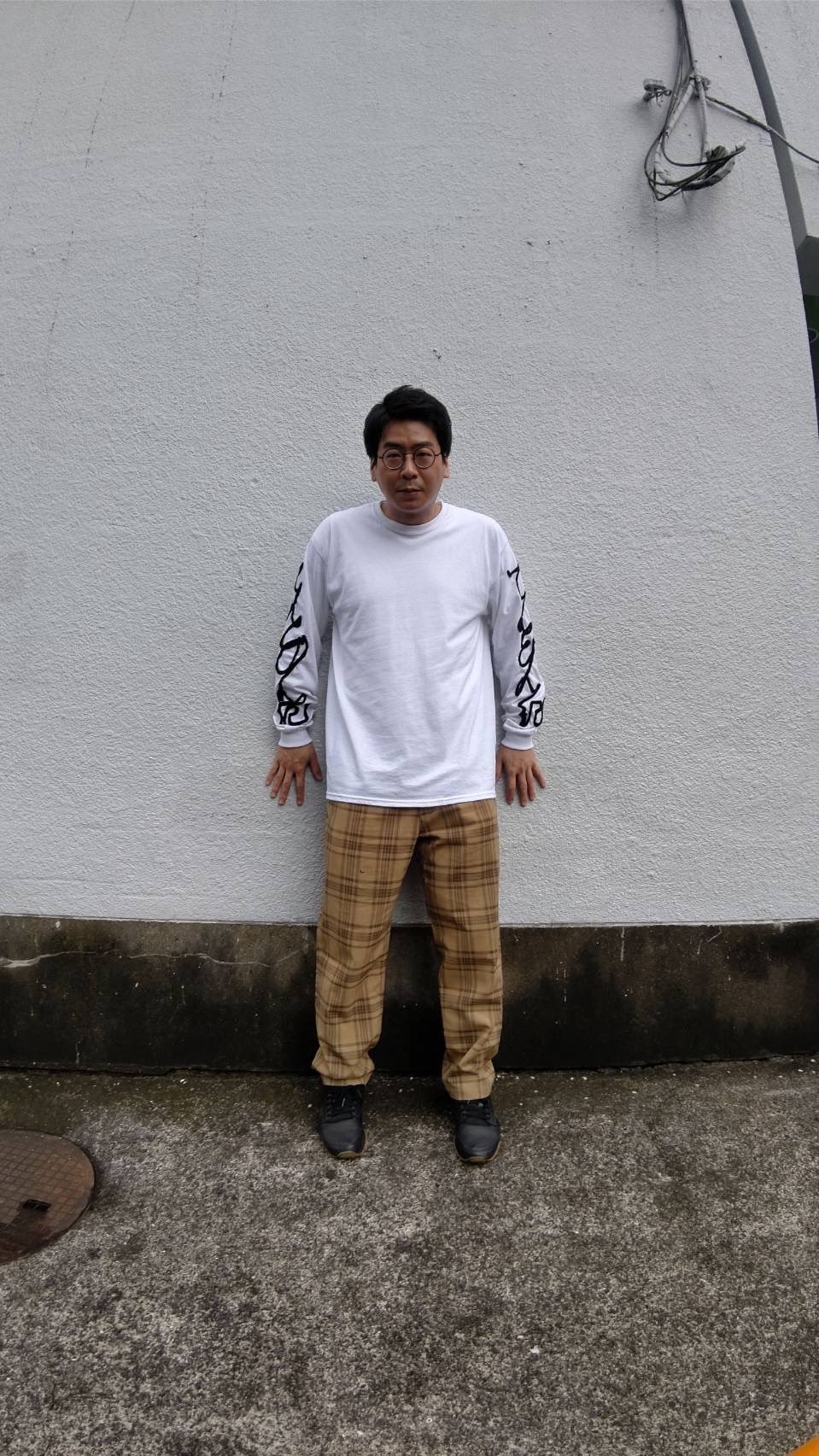途中でやめるがデザインした男性ブランコの単独ライブツアーのグッズロングTシャツ