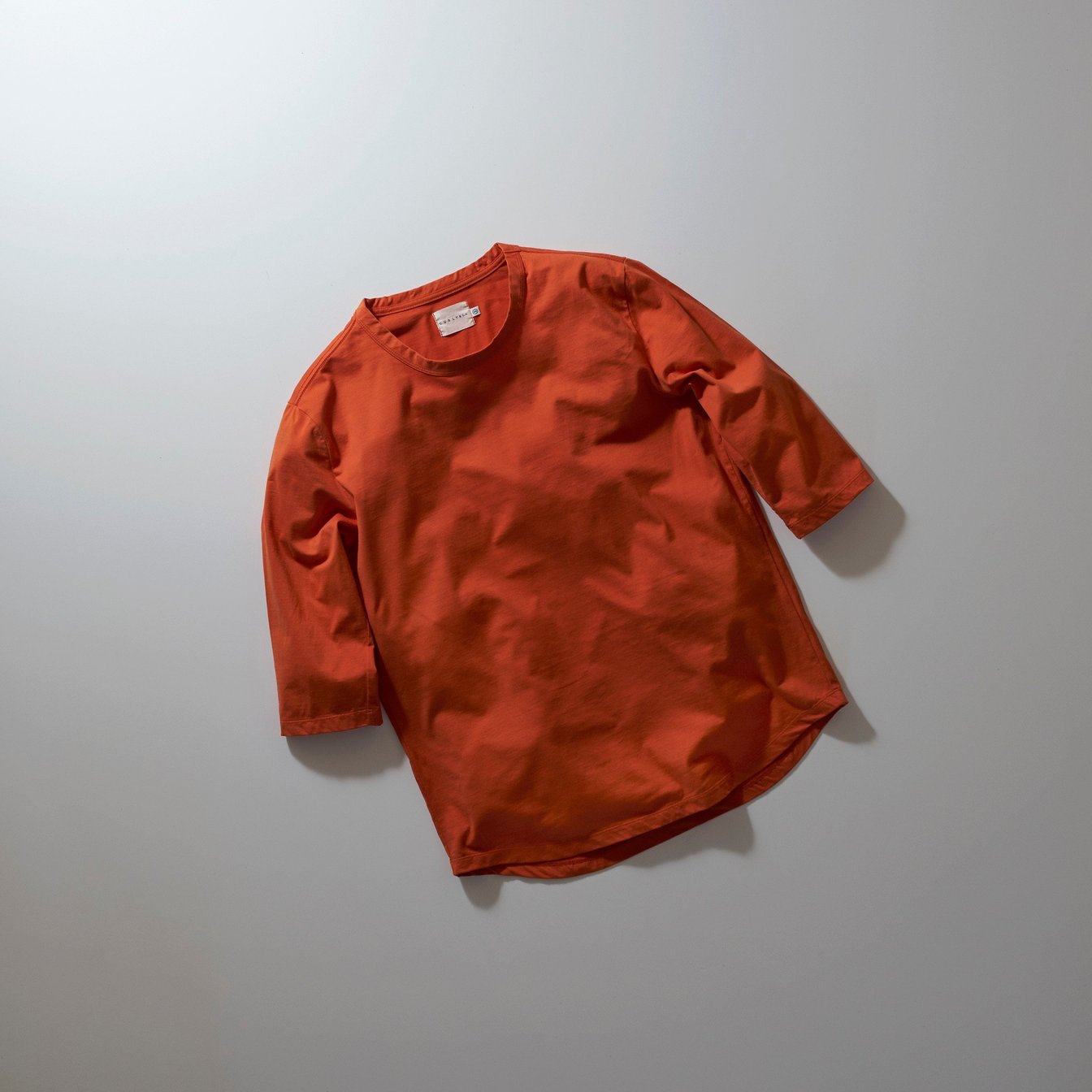 オレンジのカットソー