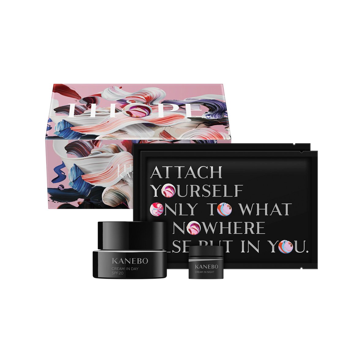 カラフルなパッケージに黒い容器のクリーム2つとシートマスクを収めたキット