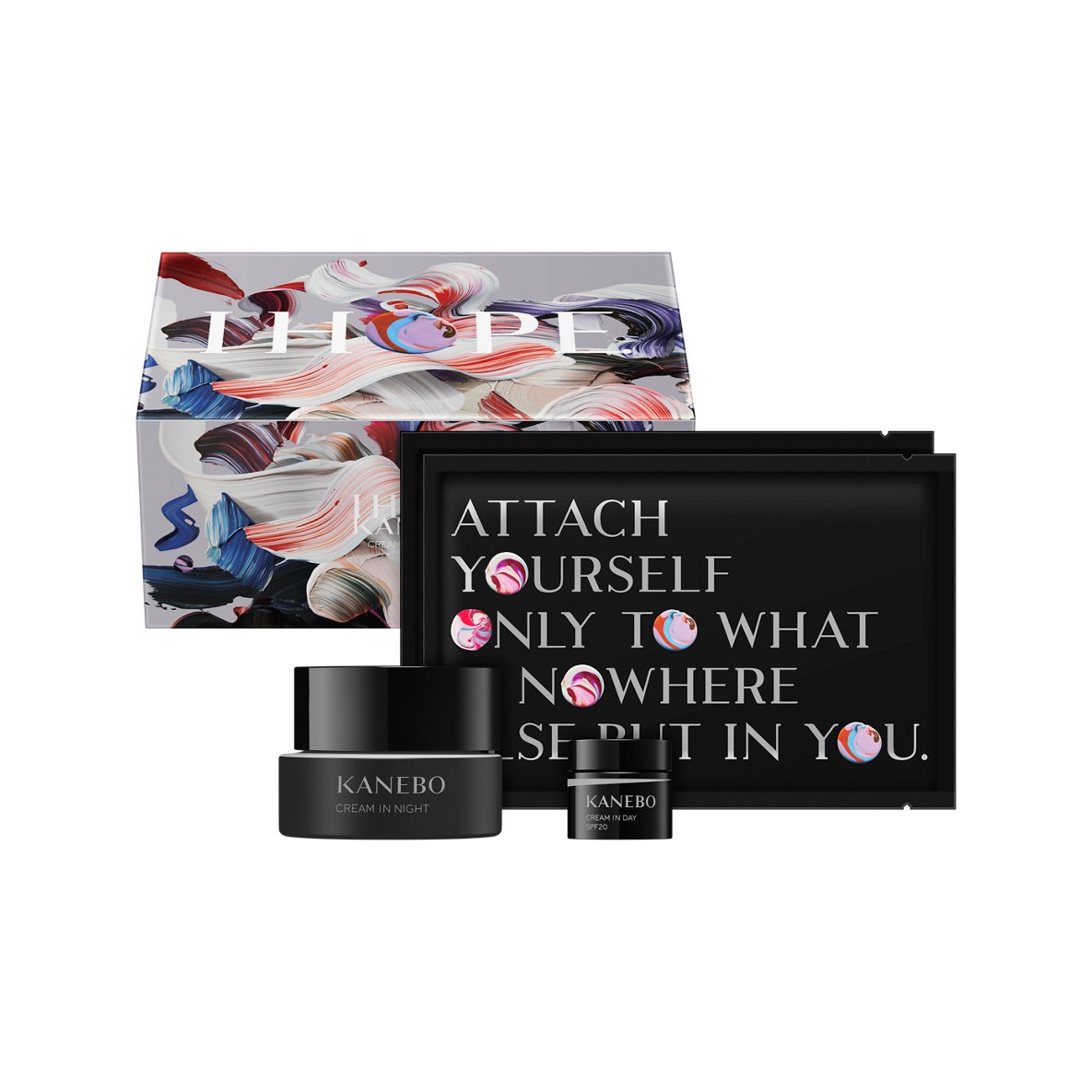 カラフルなパッケージに黒い容器のクリーム2つとシートマスクを収めたキット