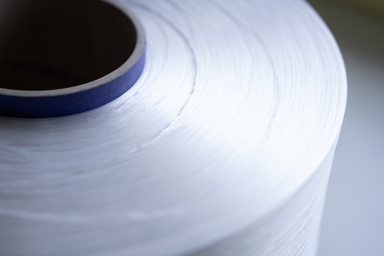 ボビンに巻かれた「エコディア®N510」の糸