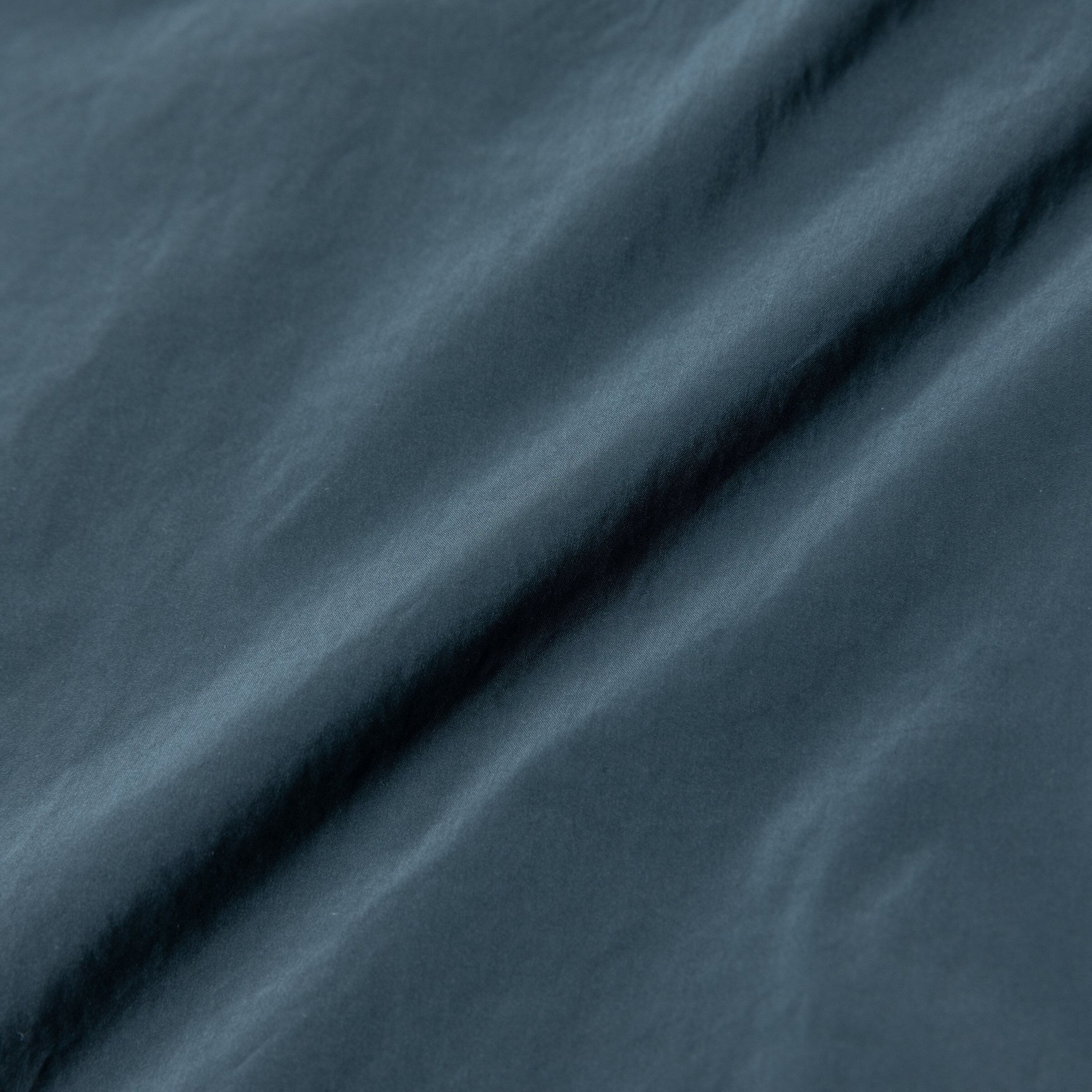 エイトンのグリーンカラーのコート