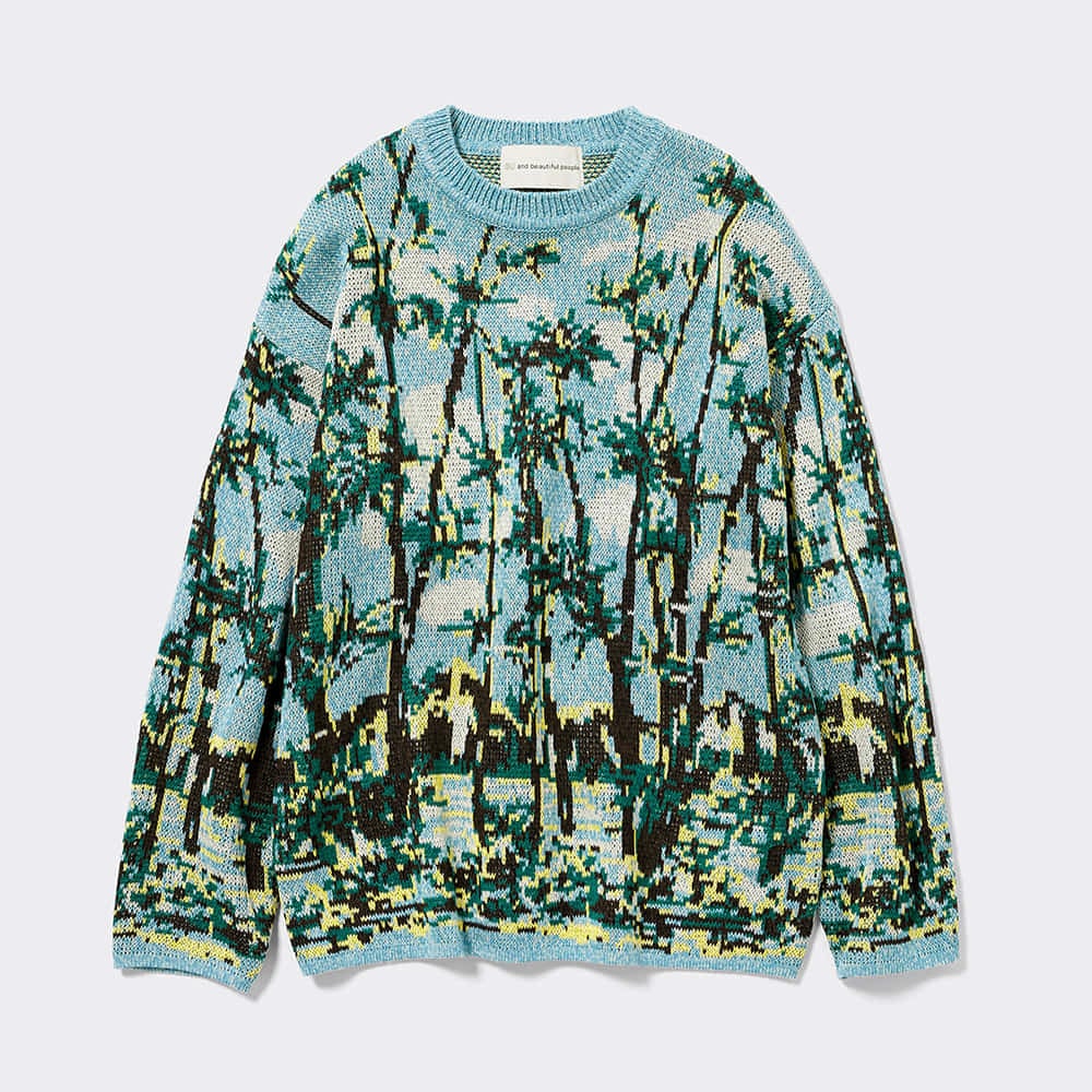 グリーンのニット