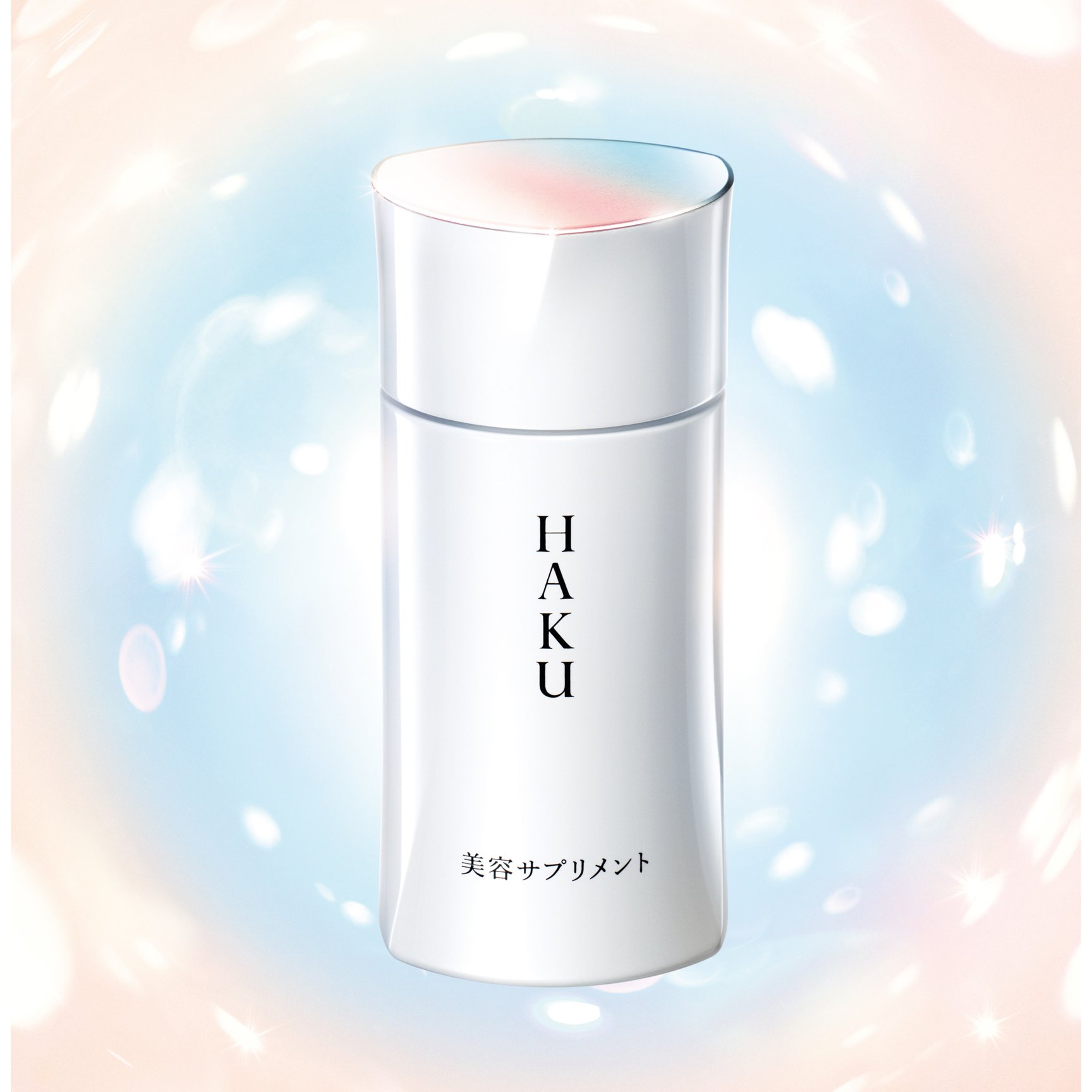 ピンクと水色の背景と白い容器に入ったサプリメント