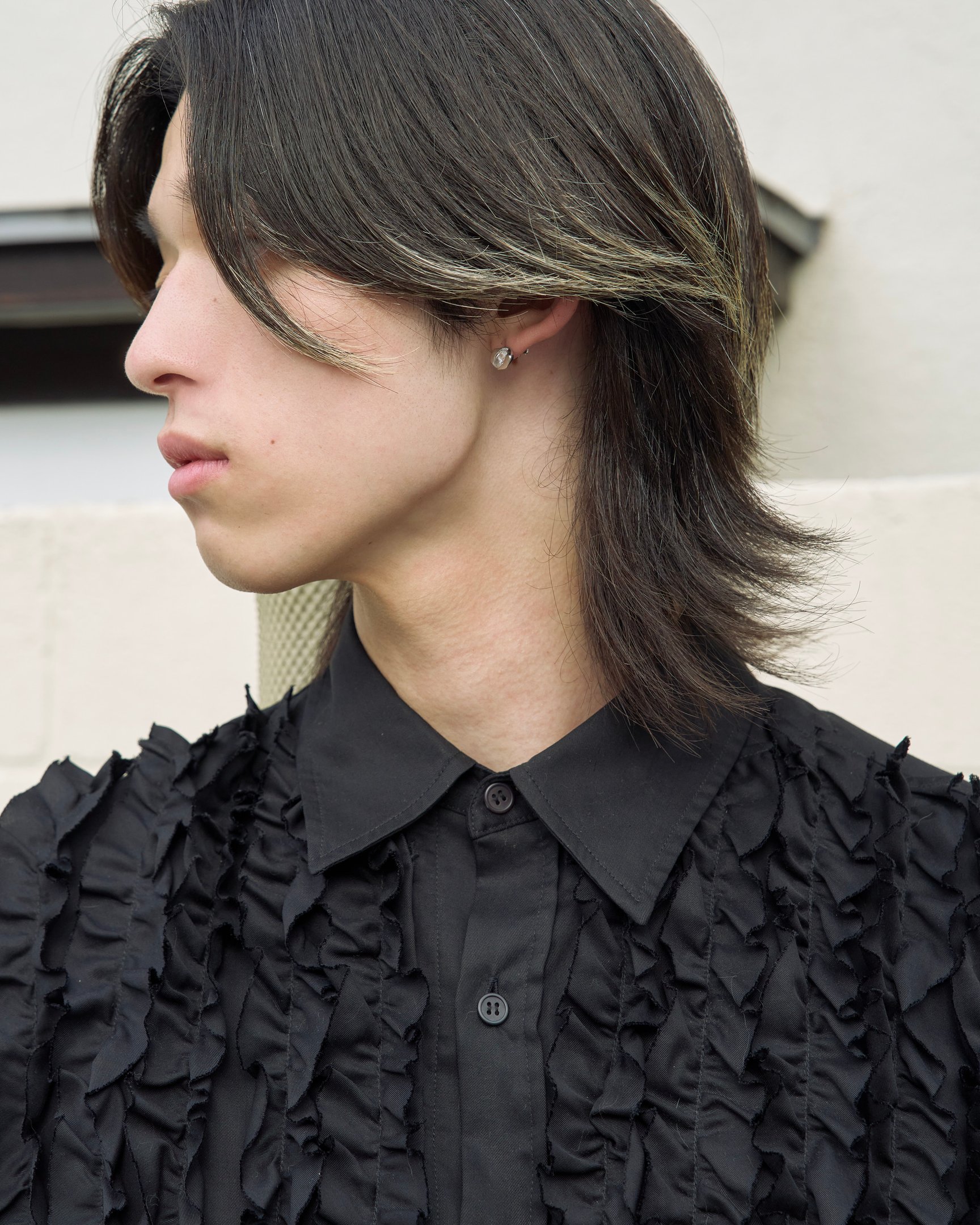 タークの洋服を着たモデル