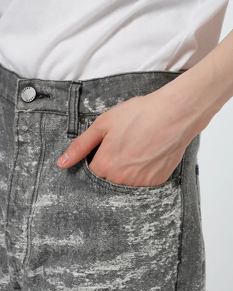 タークのデニムパンツ