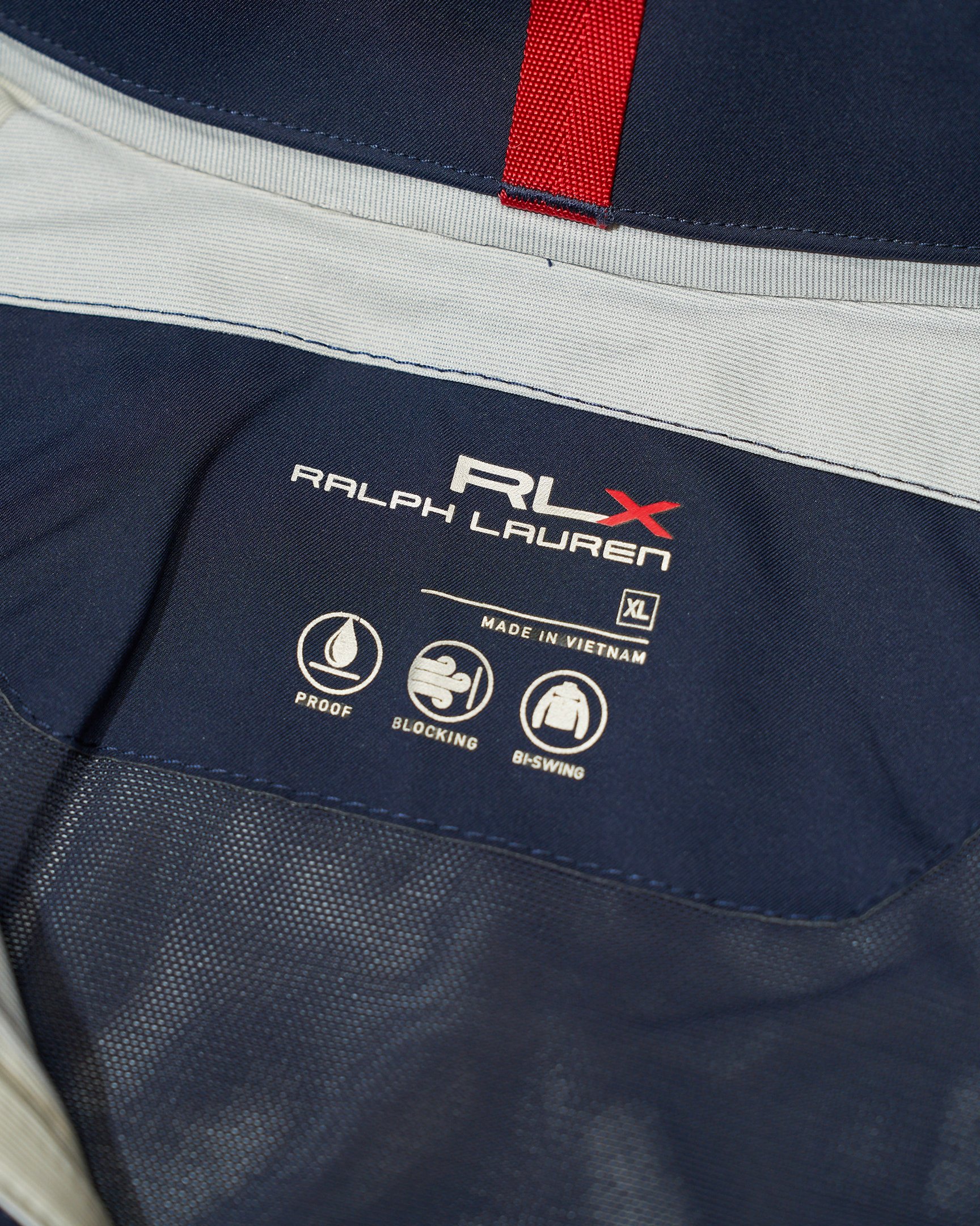 ラルフ ローレン社が1998年から現在まで展開していたレーベル「アールエルエックス ラルフ ローレン」のタグ