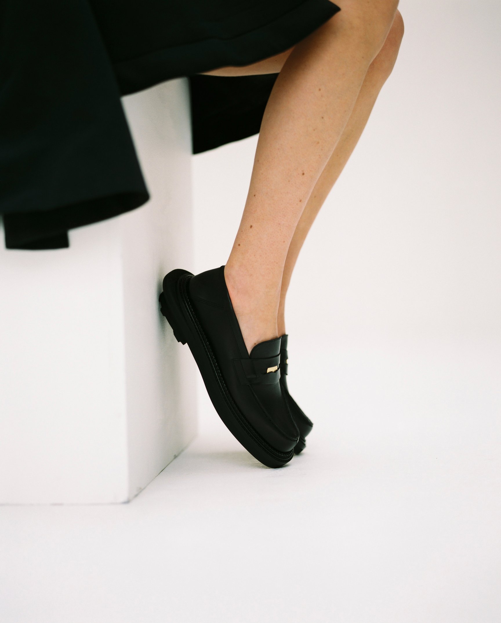 Loafer mule in black calfskin