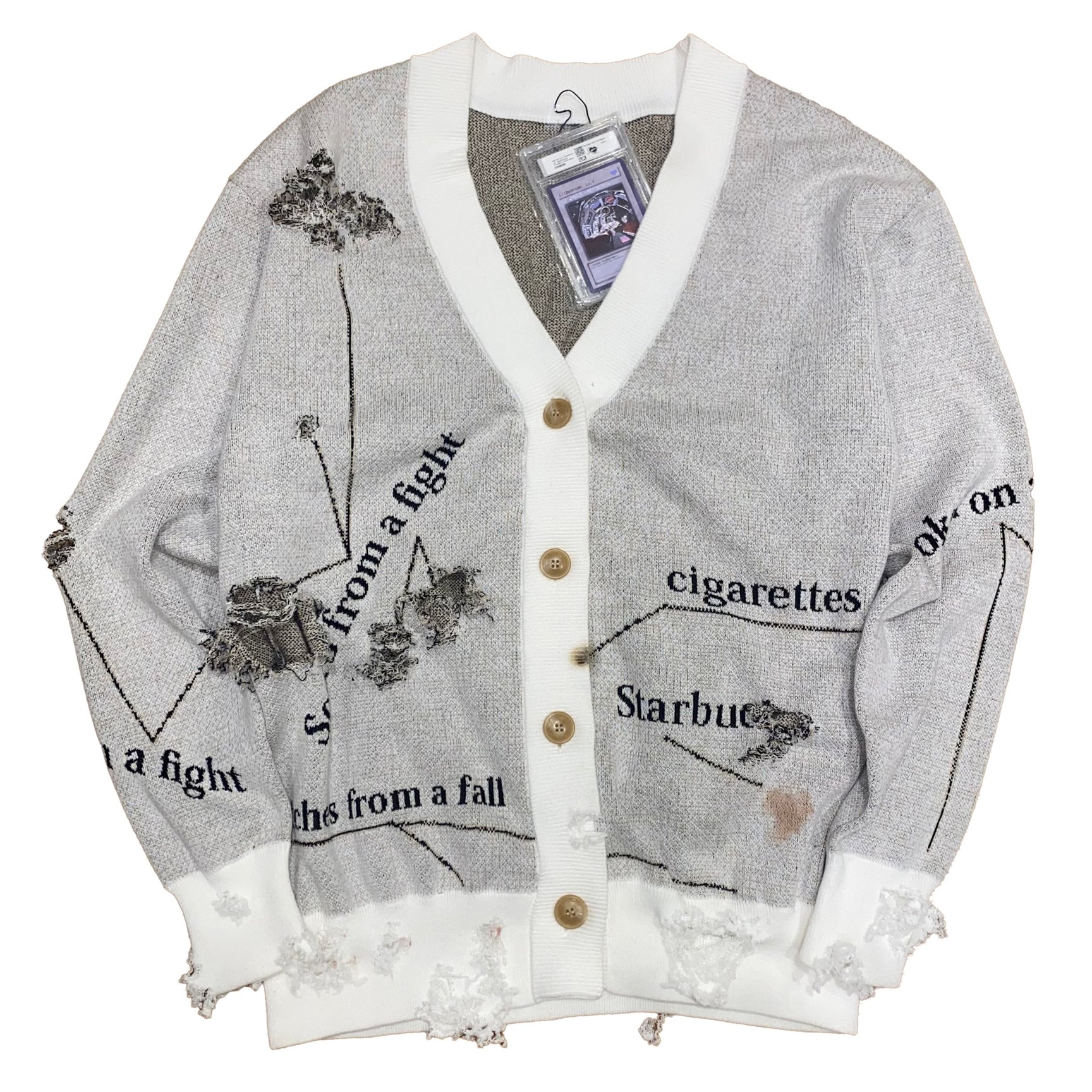 グレーのカーディガン