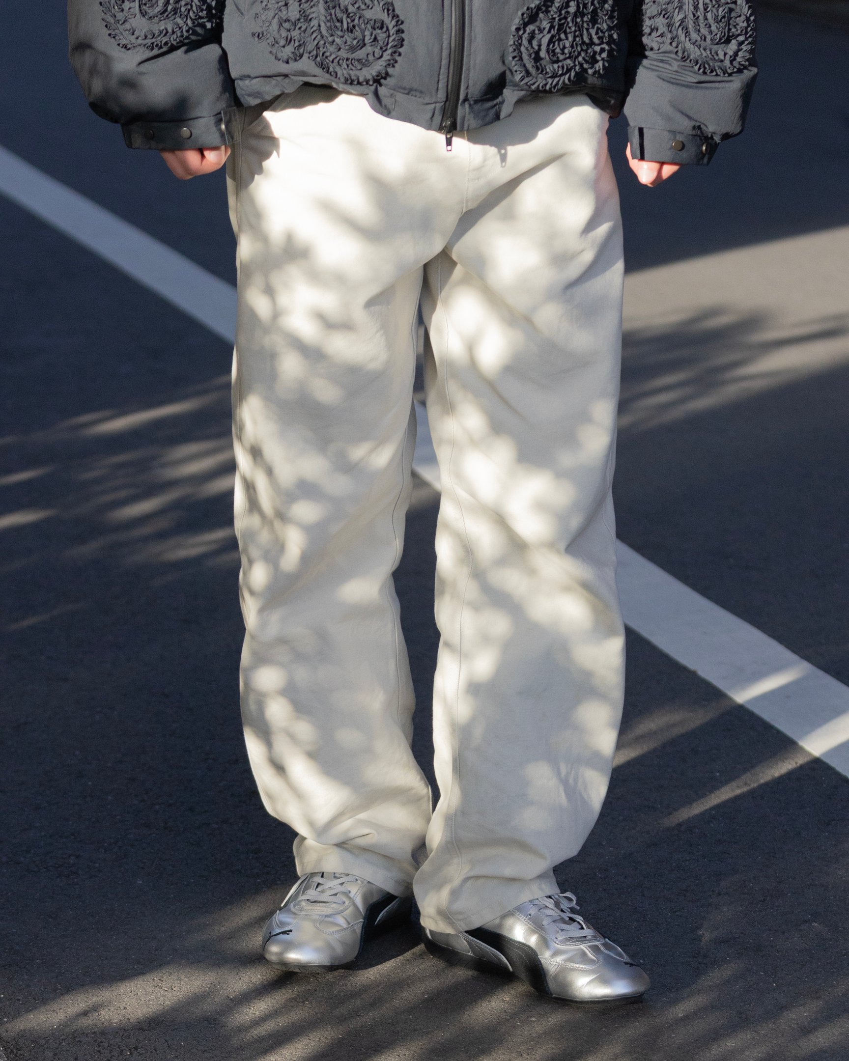 タークのダウンジャケットを着たモデル