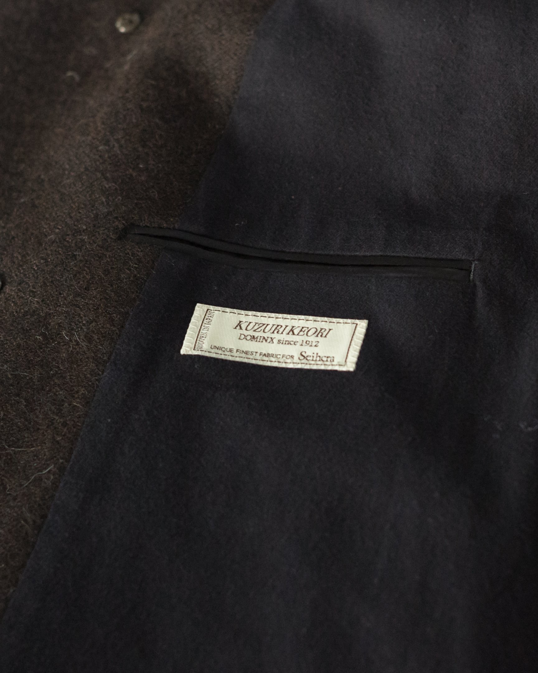 里和が企画・製作した葛利毛織のネーム