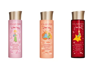 童話のデザインが描かれたピンク・オレンジ・レッドの3つの化粧水ボトルのコラージュ画像