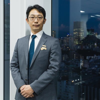 ワールド 鈴木信輝社長