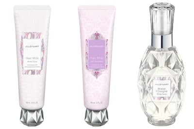 白とピンクのチューブに入ったヘアミルクと透明のボトルに入った香水