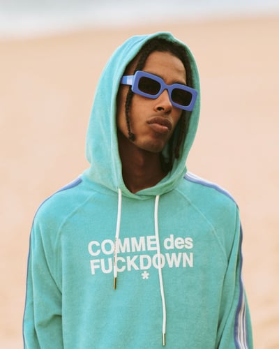 ギャルソンのパロディブランド「コム デ ファックダウン」が日本再上陸