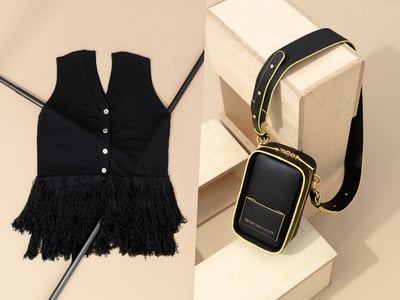 チノのフリンジベストとビエダのショルダーバッグ