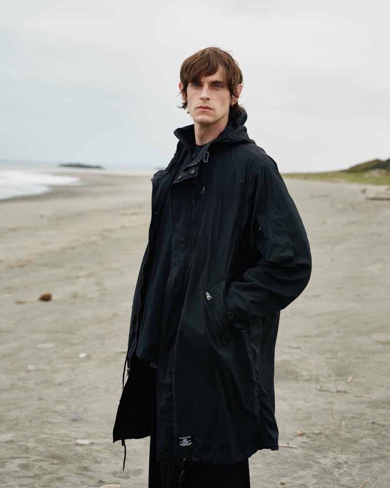 White MountaineeringとALPHA INDUSTRIESのコラボコート